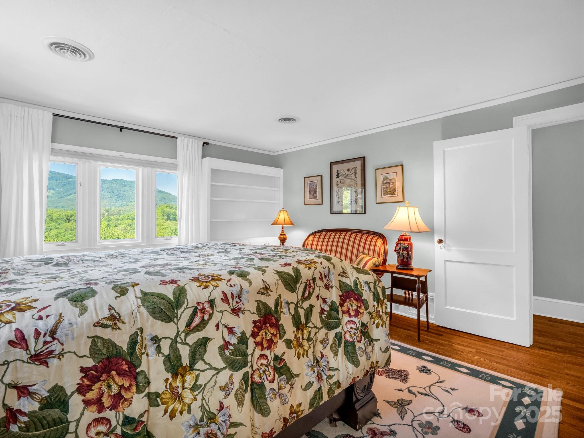 287 Pacolet Ridge Lane Tryon, NC 28782 - Photo 27 of 48 a bedroom with furniture and a window