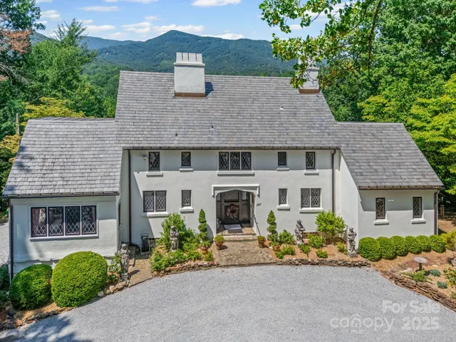 a view of workspace with furniture and a potted plant