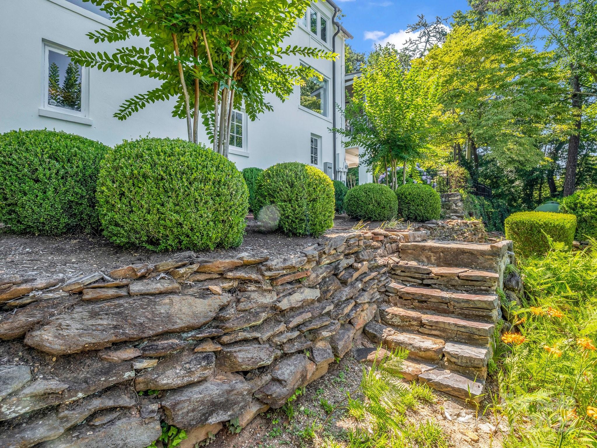 287 Pacolet Ridge Lane Tryon, NC 28782 - Photo 40 of 48 a view of a garden with a pathway