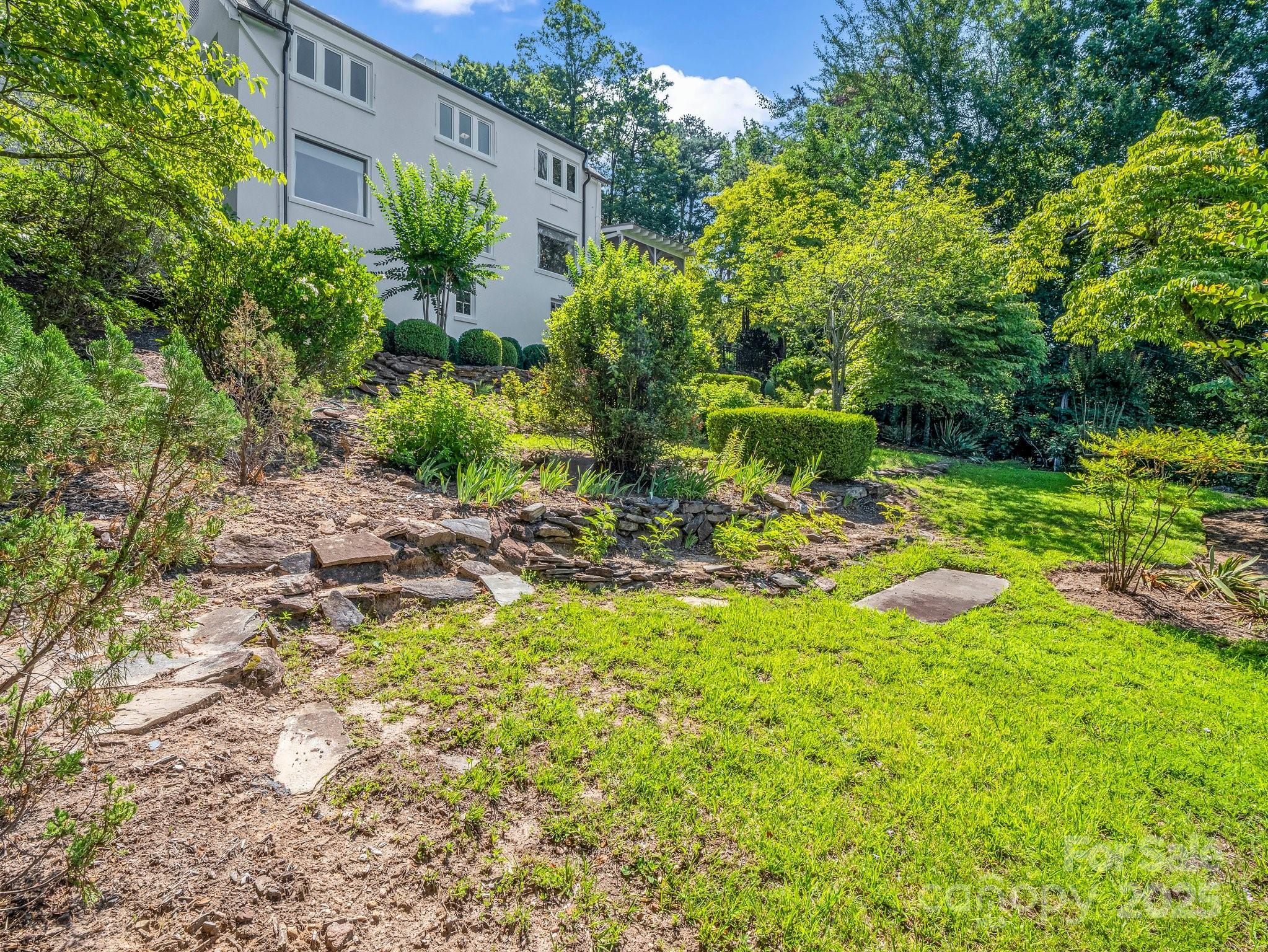 287 Pacolet Ridge Lane Tryon, NC 28782 - Photo 41 of 48 a view of a garden with plants