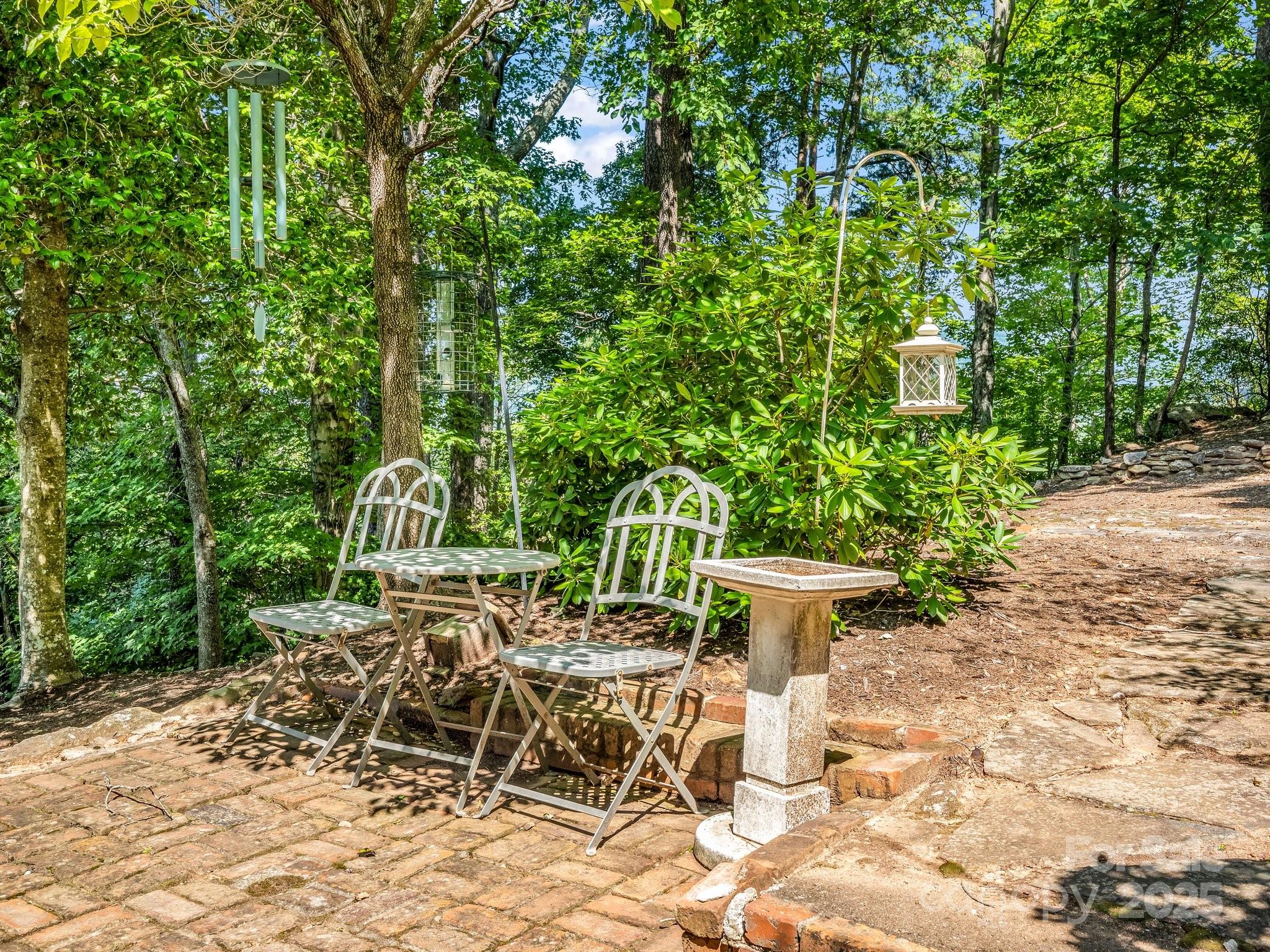 287 Pacolet Ridge Lane Tryon, NC 28782 - Photo 42 of 48 a view of a backyard with sitting area