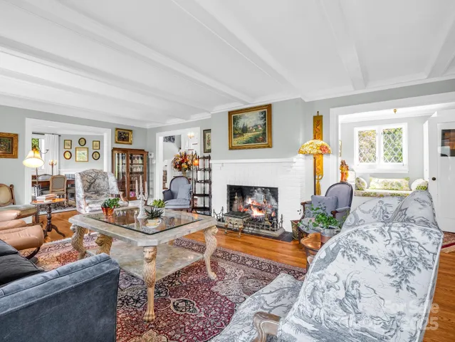 a dining room with furniture window wooden floor