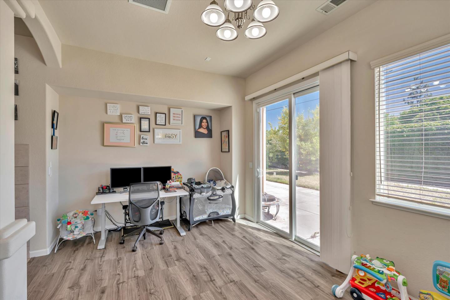 390 Munter Street Manteca, CA 95337 - Photo 12 of 26 a living room with furniture and a window