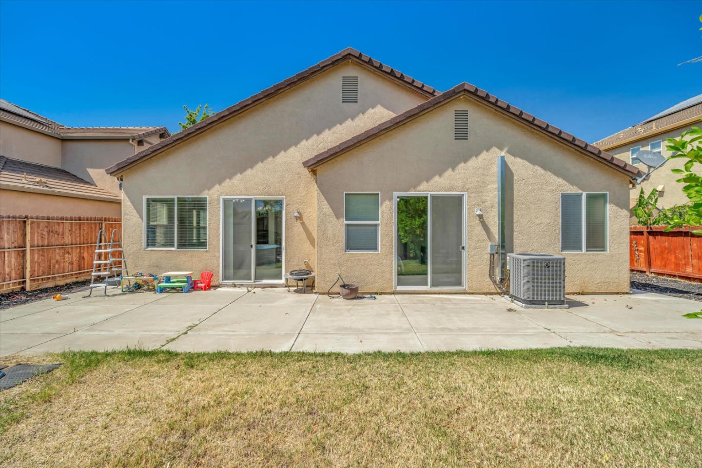 390 Munter Street Manteca, CA 95337 - Photo 26 of 26 a view of a house with a patio