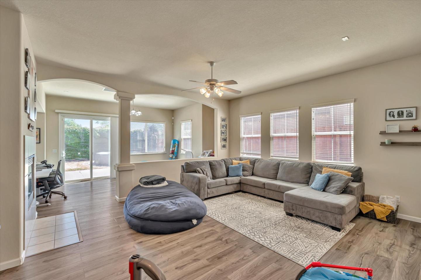 390 Munter Street Manteca, CA 95337 - Photo 4 of 26 a living room with furniture and a large window
