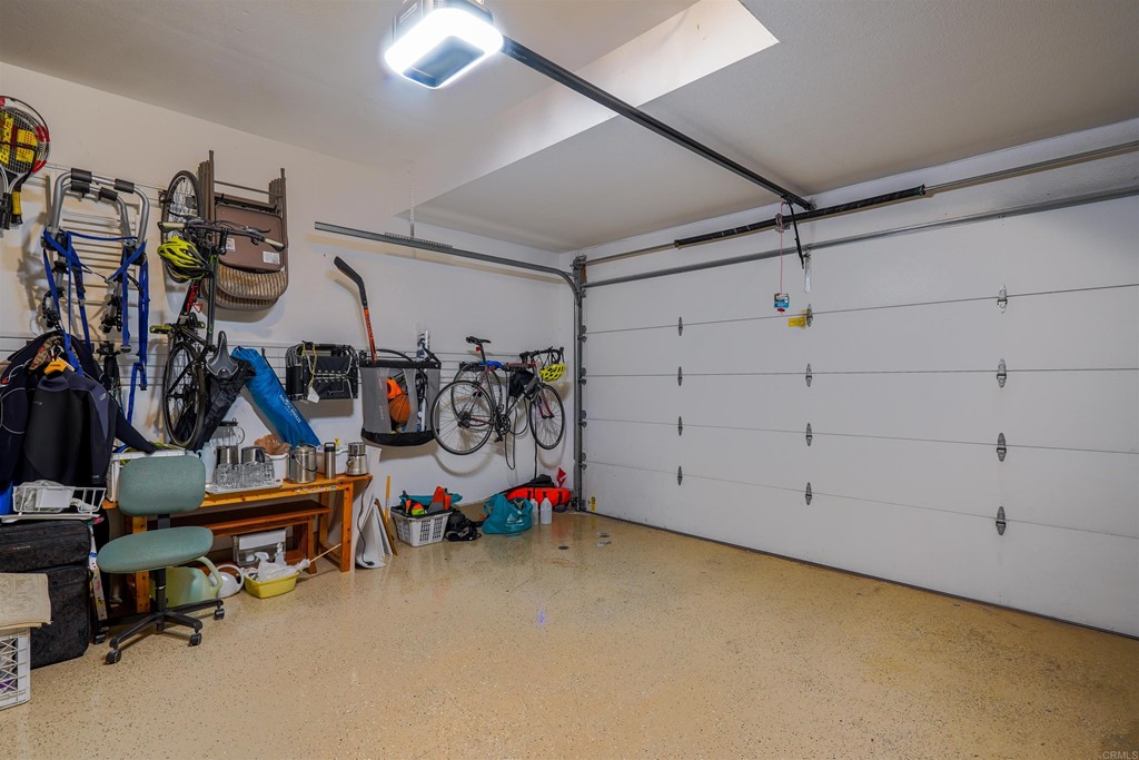 9735 Claiborne Square La Jolla, CA 92037 - Photo 55 of 60 a view of a room with gym equipment