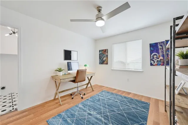 a workspace with furniture and a window