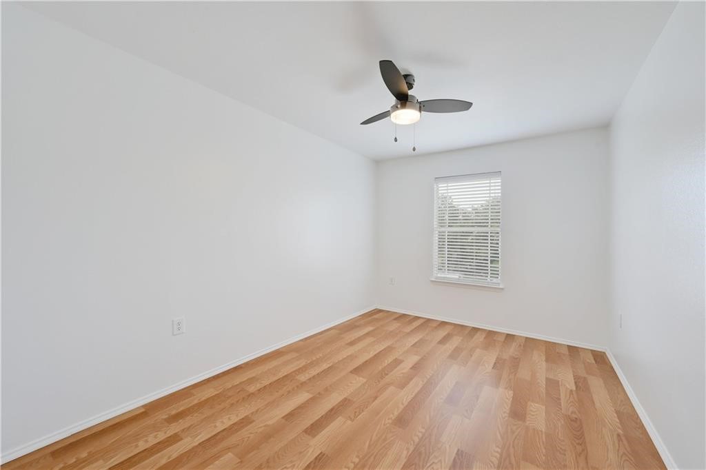 12329 Sky Harbor Drive Del Valle, TX 78617 - Photo 5 of 29 a view of an empty room with a window