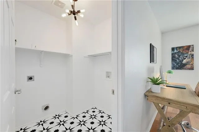 a view of kitchen with furniture and wooden floor