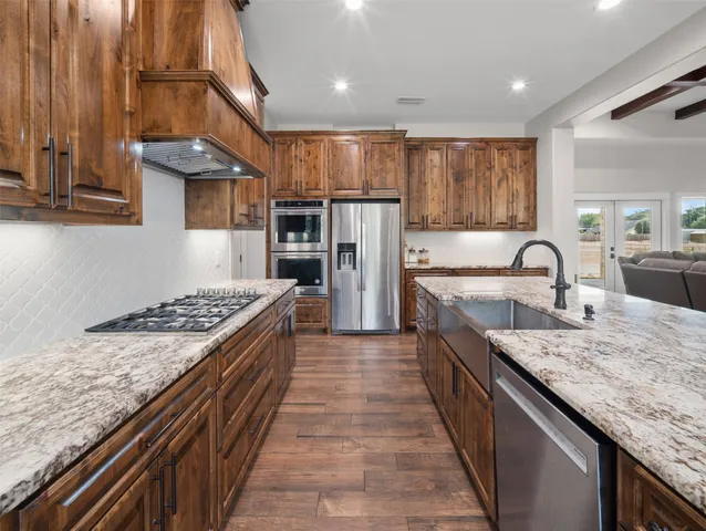 a work room with furniture and a book shelf