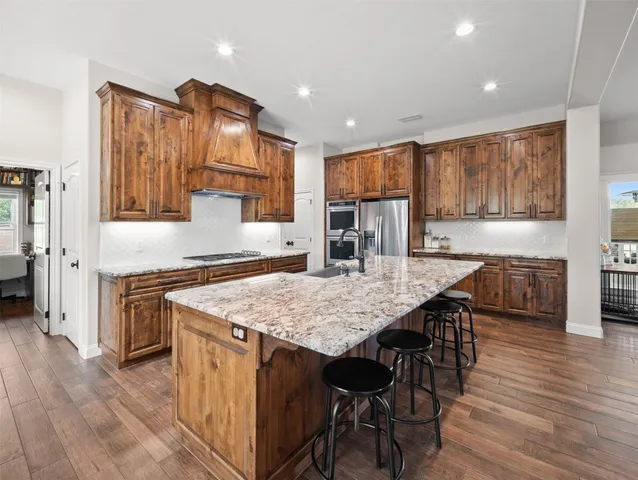 a bedroom with a bed and furniture