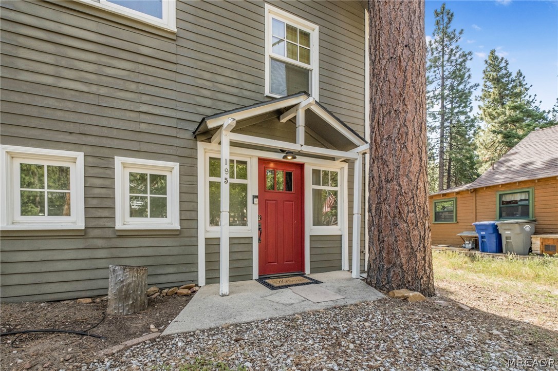 195 Elgin Road Big Bear Lake, CA 92315 - Photo 31 of 45 front view of a house with a yard