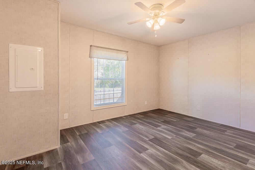 475 AJ Mills Road Ponte Vedra, FL 32081 - Photo 26 of 34 wooden floor in an empty room with a window