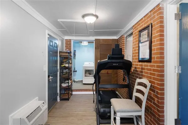 a view of livingroom with furniture and wooden floor