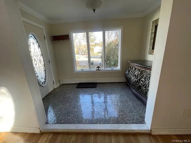 a view of an entryway with sitting area