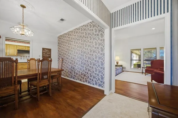 a view of a livingroom with furniture and window