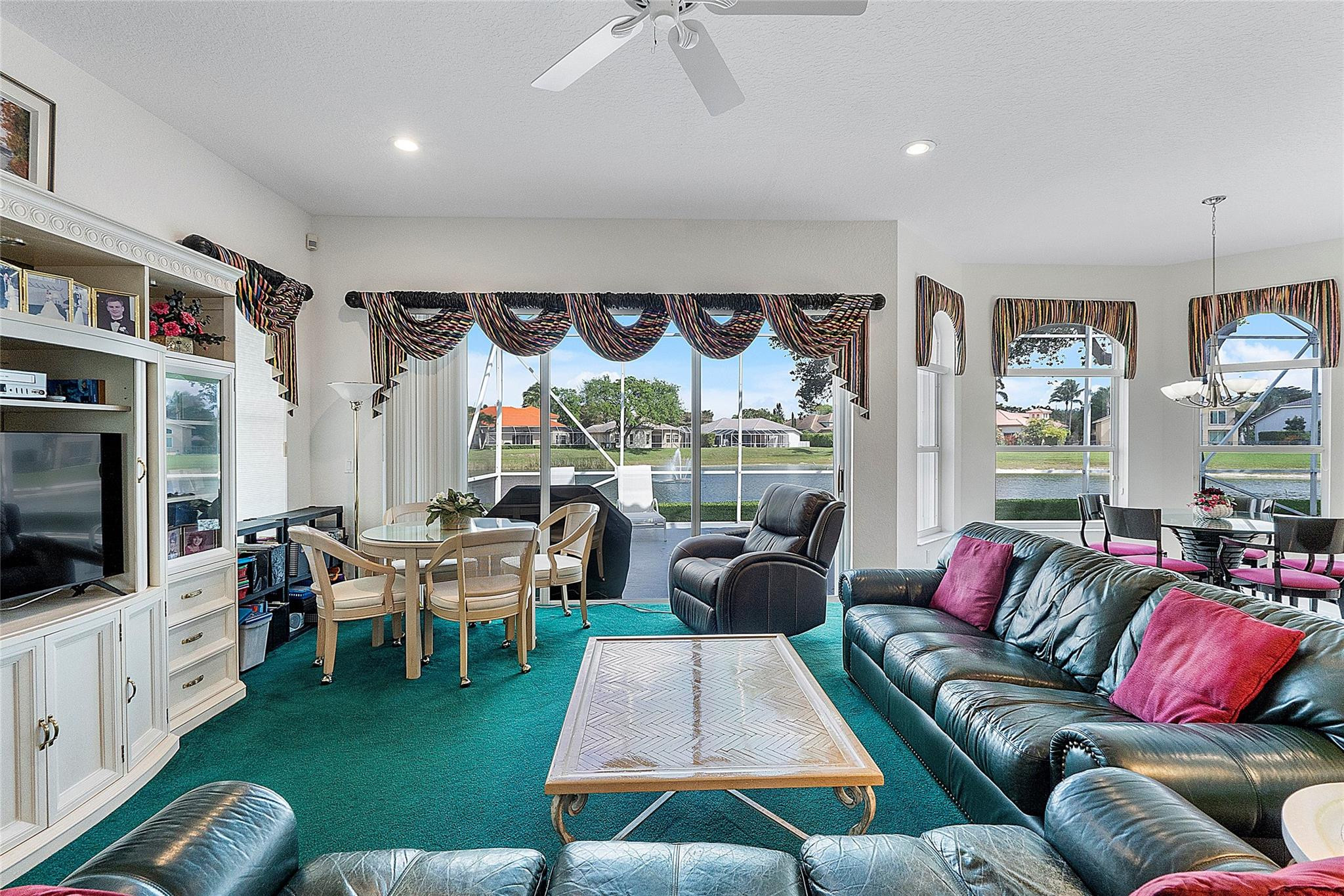 22293 Rushmore Place Boca Raton, FL 33428 - Photo 23 of 59 a living room with furniture and a flat screen tv