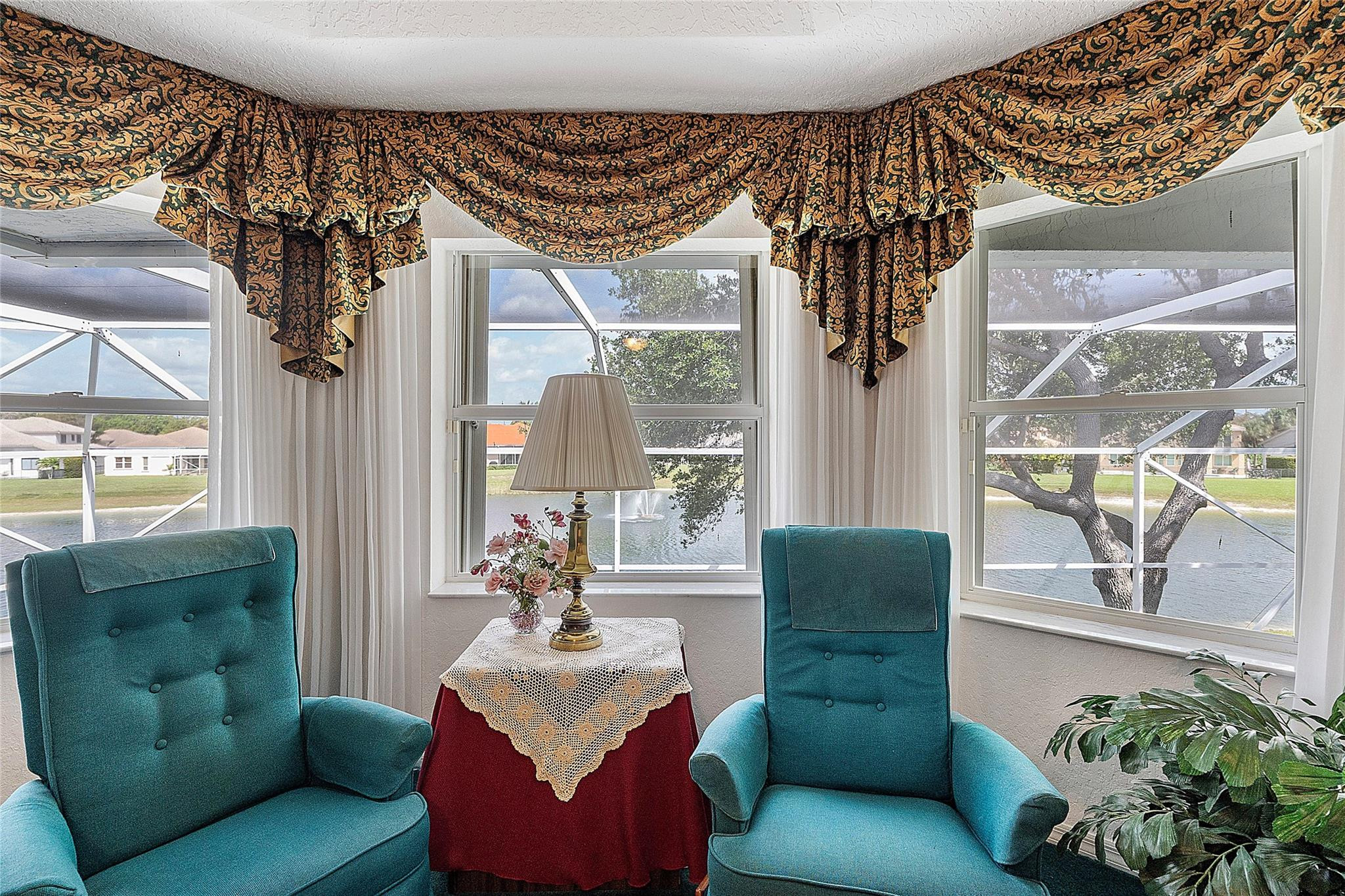 22293 Rushmore Place Boca Raton, FL 33428 - Photo 33 of 59 a living room with furniture and a large window