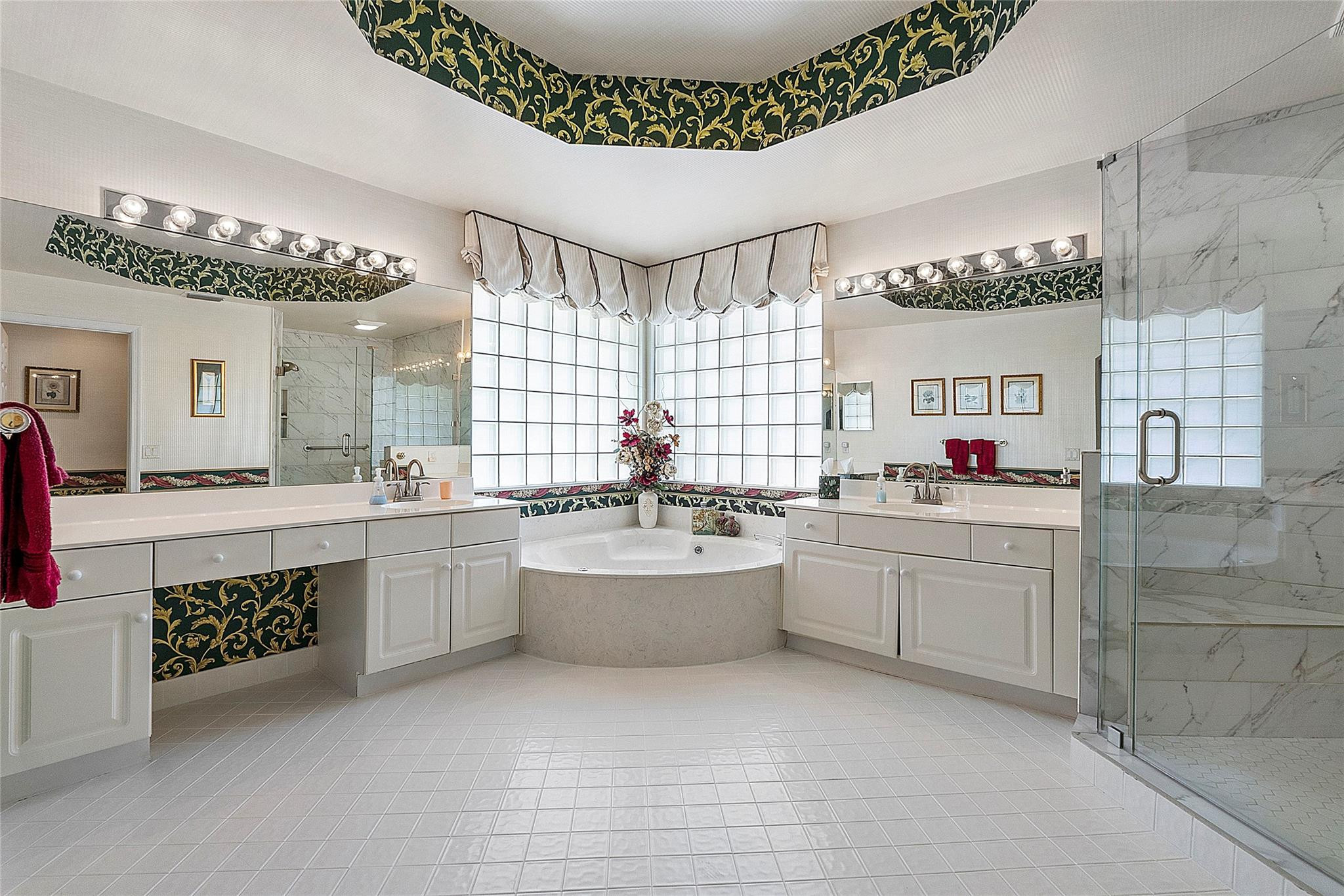 22293 Rushmore Place Boca Raton, FL 33428 - Photo 34 of 59 a large white kitchen with a large window