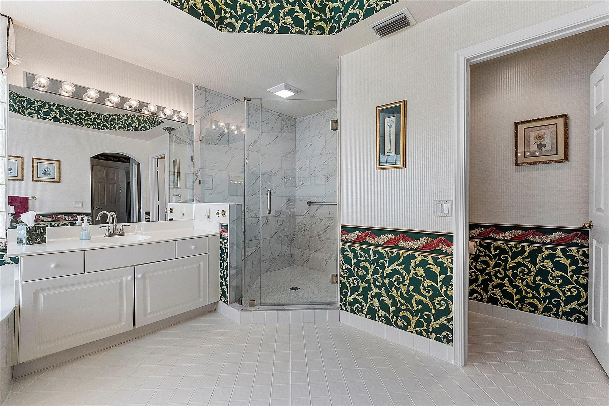 22293 Rushmore Place Boca Raton, FL 33428 - Photo 36 of 59 a bathroom with a double vanity sink mirror and