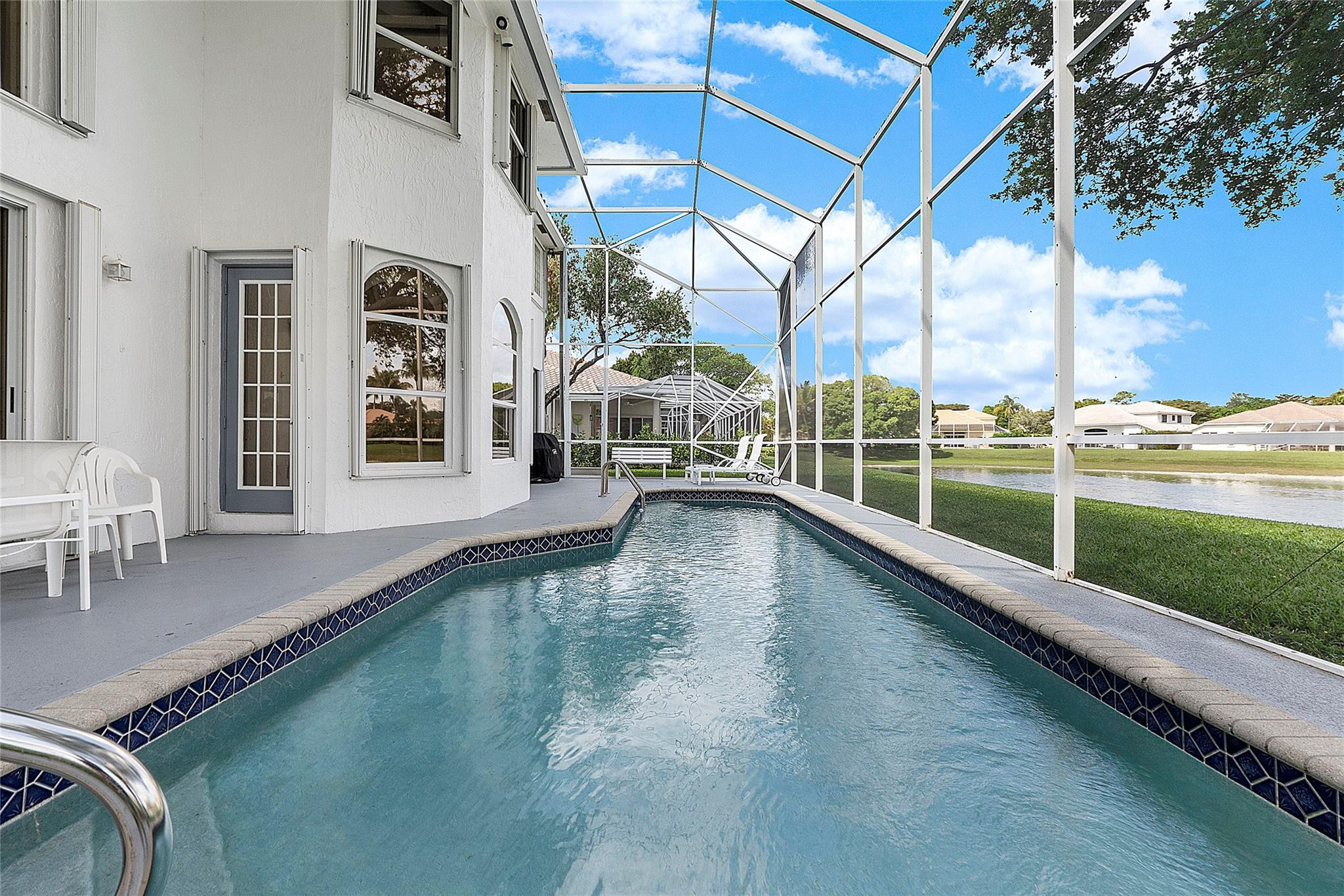 22293 Rushmore Place Boca Raton, FL 33428 - Photo 41 of 59 swimming pool view with a outdoor space