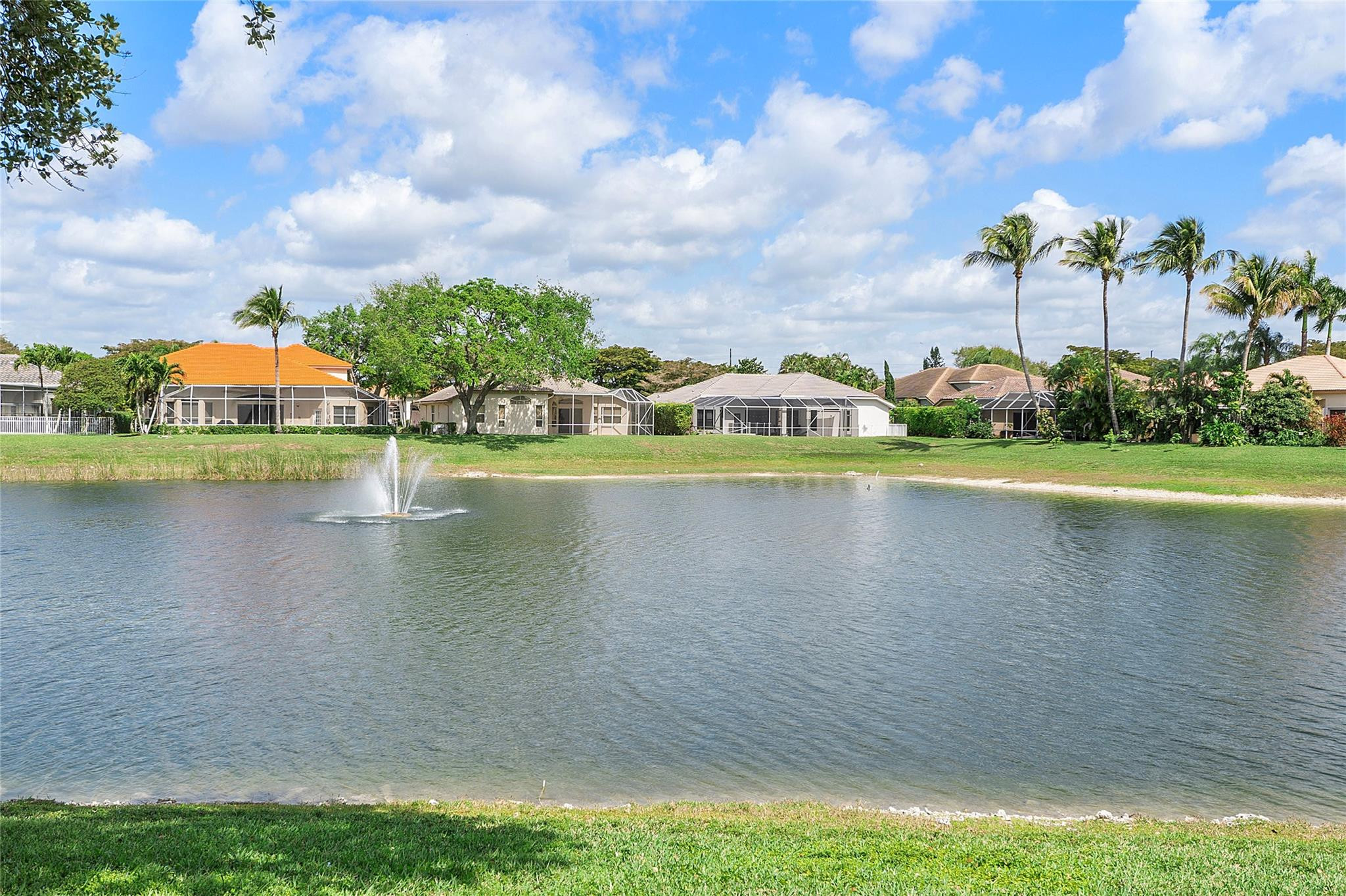 22293 Rushmore Place Boca Raton, FL 33428 - Photo 46 of 59 a view of a lake with houses in the background