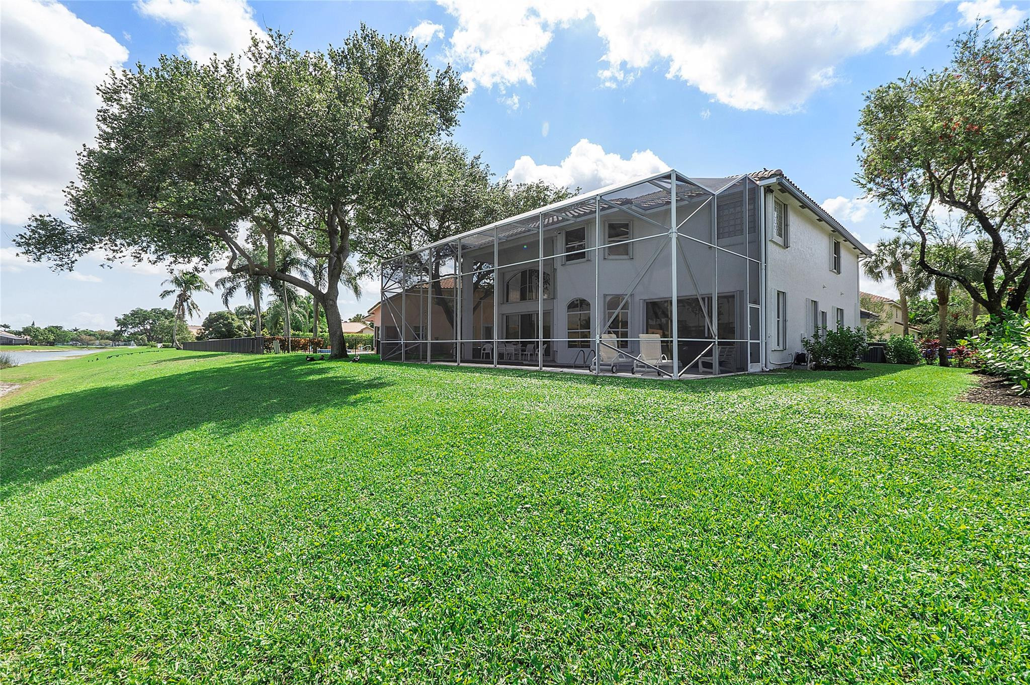 22293 Rushmore Place Boca Raton, FL 33428 - Photo 47 of 59 a view of a house with yard and a garden