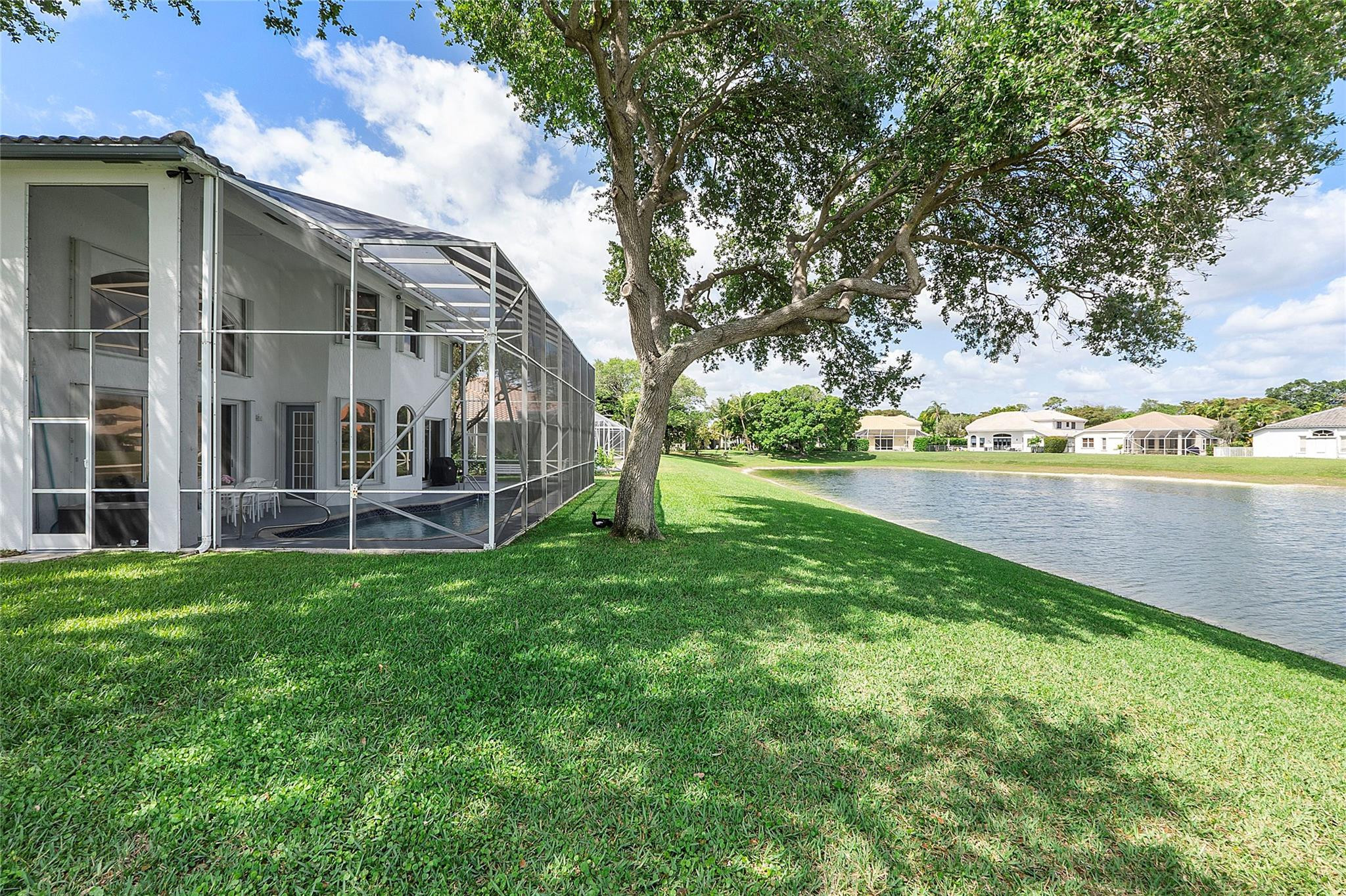 22293 Rushmore Place Boca Raton, FL 33428 - Photo 51 of 59 a view of a house with a yard and sitting area