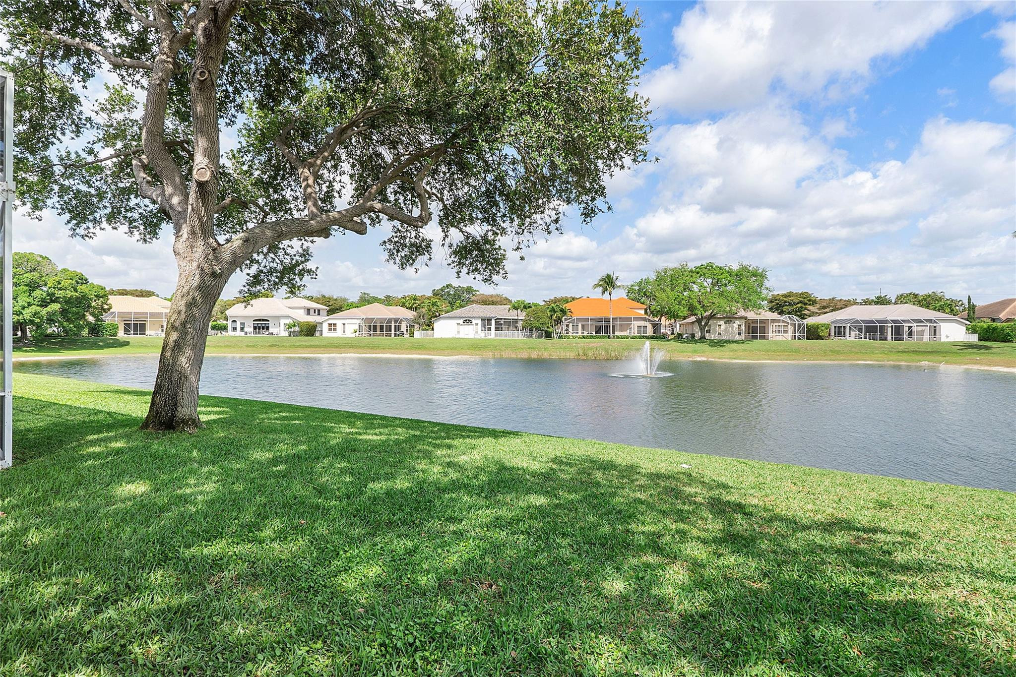 22293 Rushmore Place Boca Raton, FL 33428 - Photo 52 of 59 a view of a lake with houses in the back