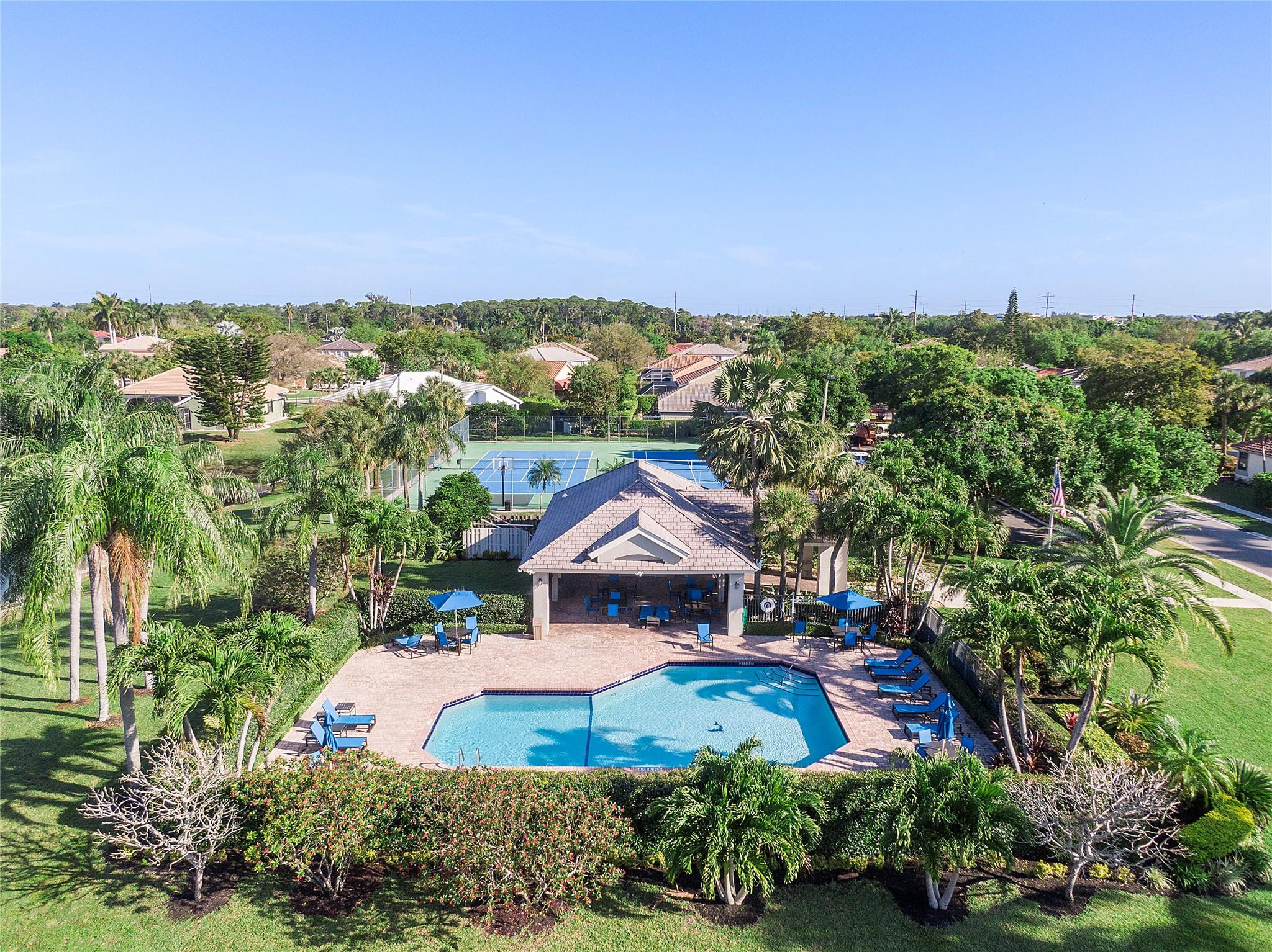 22293 Rushmore Place Boca Raton, FL 33428 - Photo 53 of 59 an aerial view of a house with a garden and lake view
