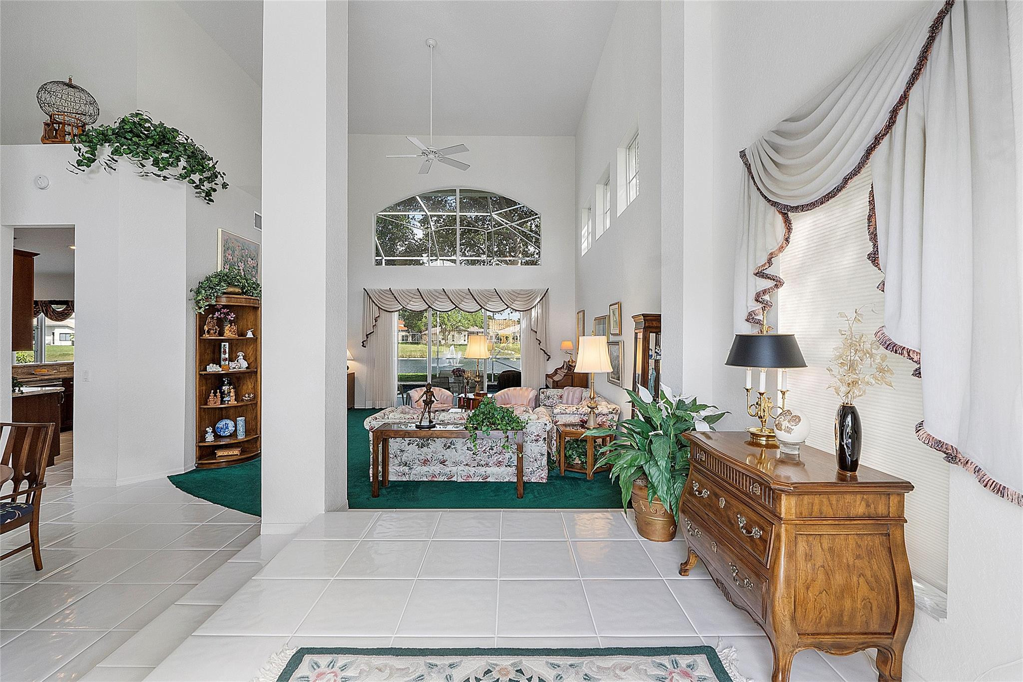 22293 Rushmore Place Boca Raton, FL 33428 - Photo 6 of 59 a living room with furniture and a potted plant