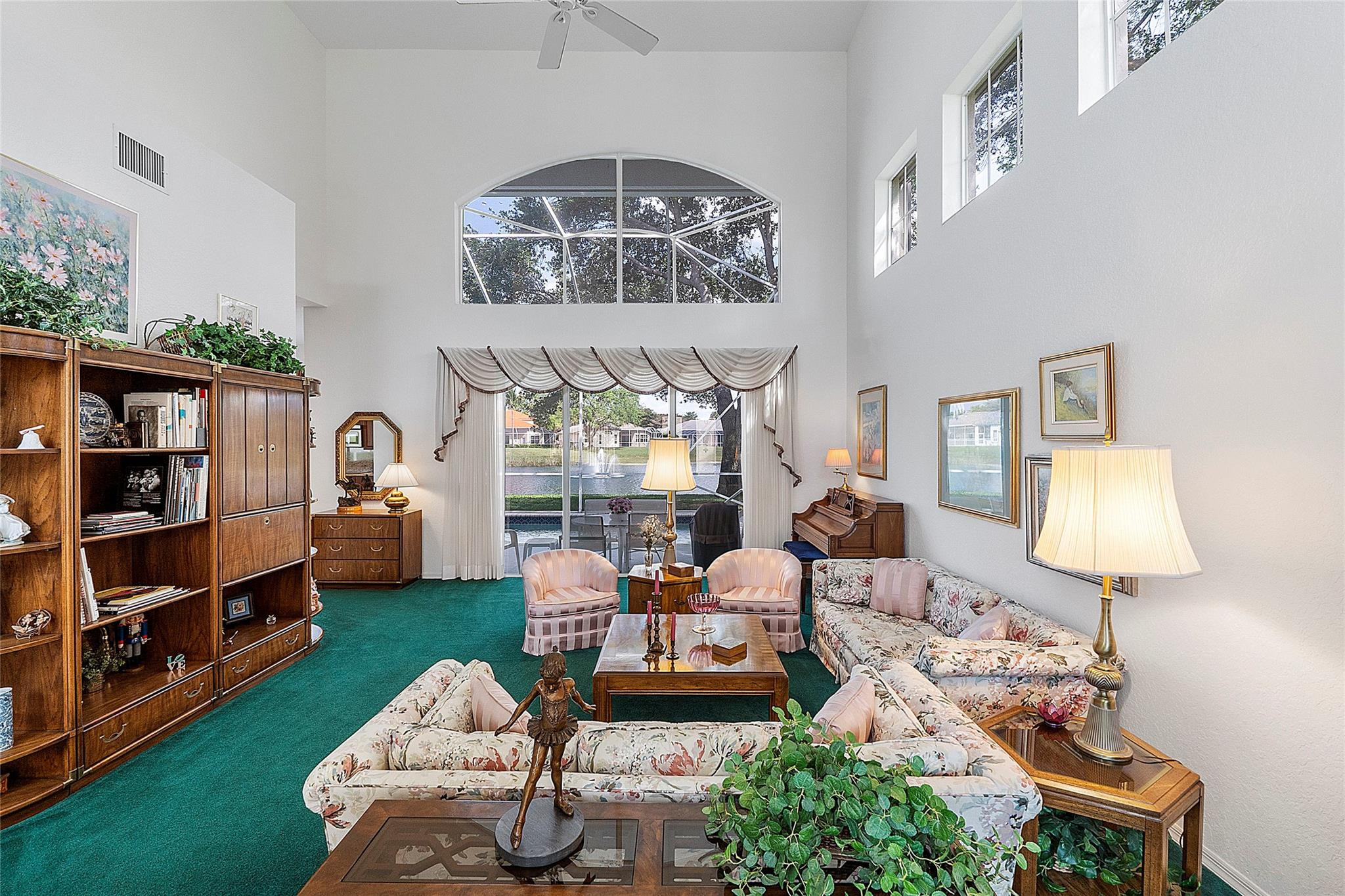 22293 Rushmore Place Boca Raton, FL 33428 - Photo 7 of 59 a living room with furniture and a chandelier