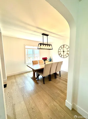 a reading room with furniture and a table