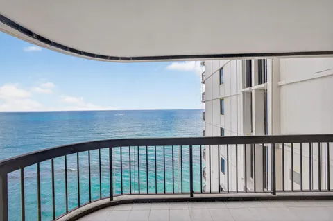 a bedroom with a large bed and a dresser