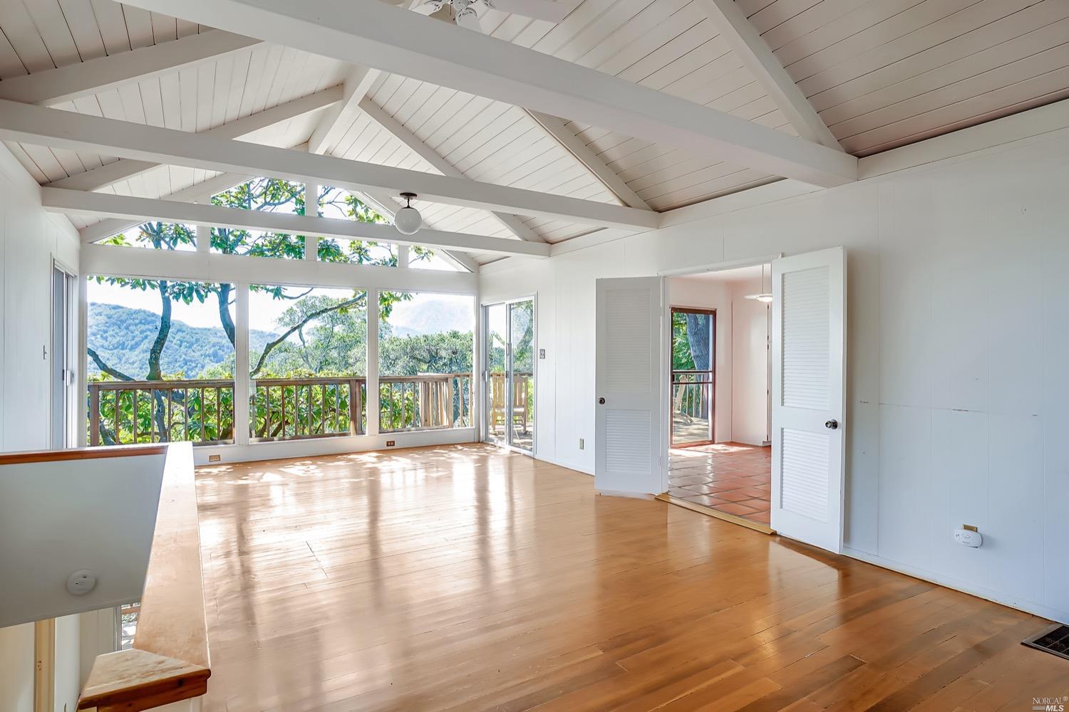 43 Ridge Road Fairfax, CA 94930 - Photo 1 of 1 a view of an empty room with wooden floor and a window