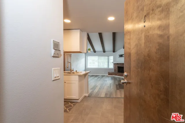 a view of a kitchen with a sink