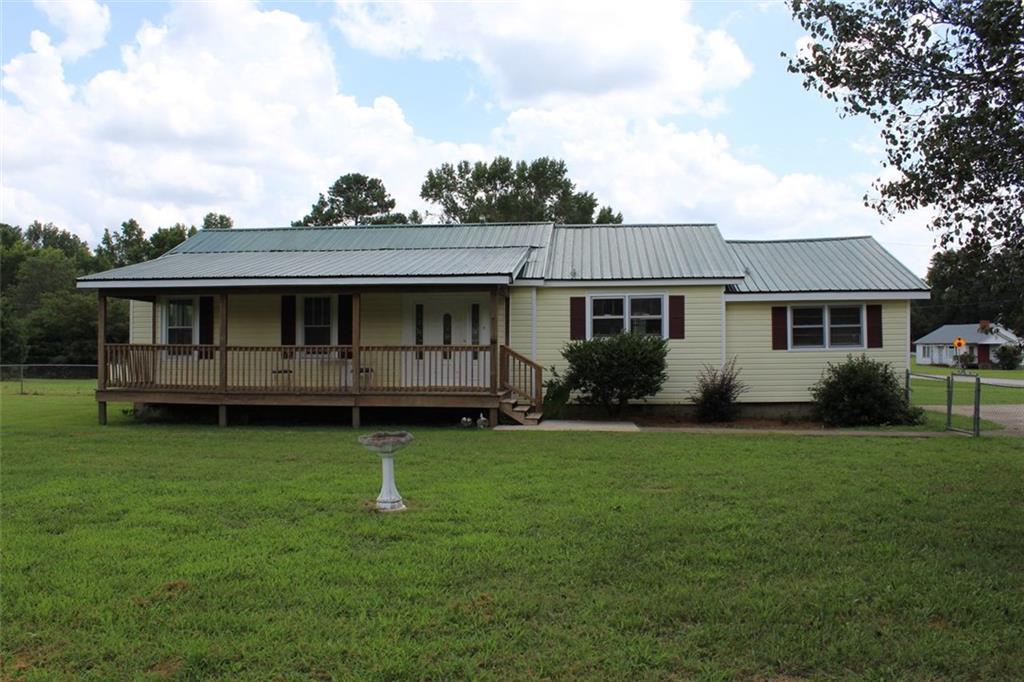 4 Springlake Estates Road Crawford, GA 30630 - Photo 1 of 1 front view of a house with a yard