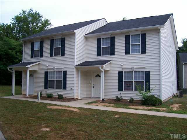 1315 East Lane Street, Unit 2 Raleigh, NC 27610 - Photo 1 of 11 a view of a house with a yard and plants