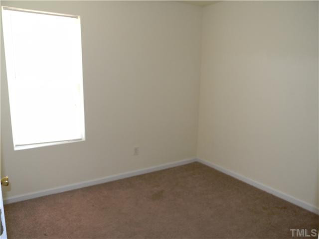 1315 East Lane Street, Unit 2 Raleigh, NC 27610 - Photo 9 of 11 an empty room with a window