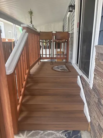 a bunch of flowers sitting in front of door