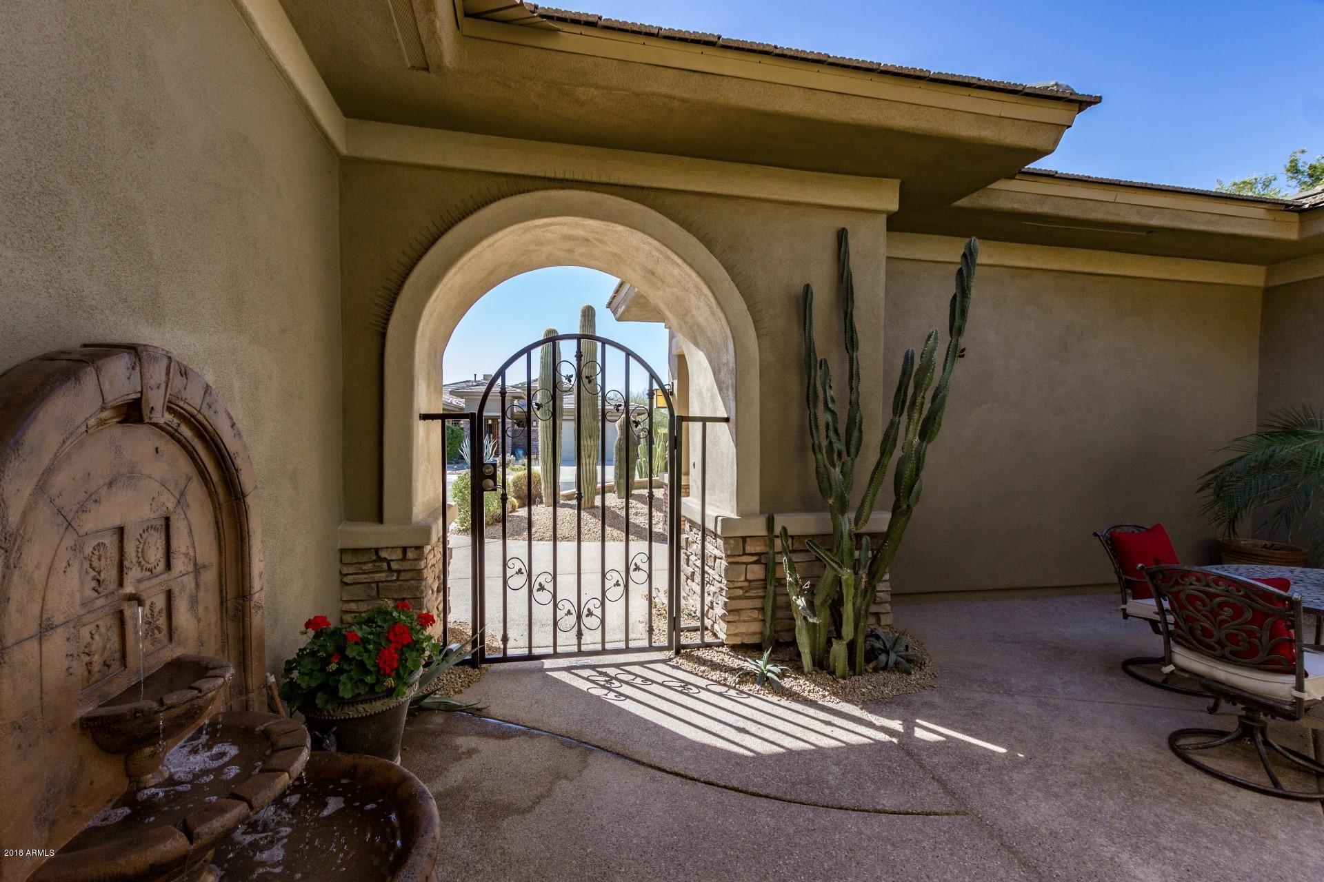 18096 West Narramore Road Goodyear, AZ 85338 - Photo 5 of 54 Gated Courtyard
