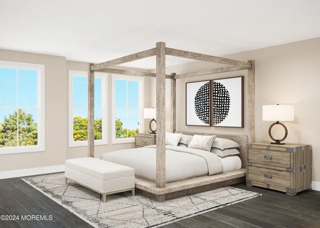 a kitchen with a table chairs refrigerator and microwave