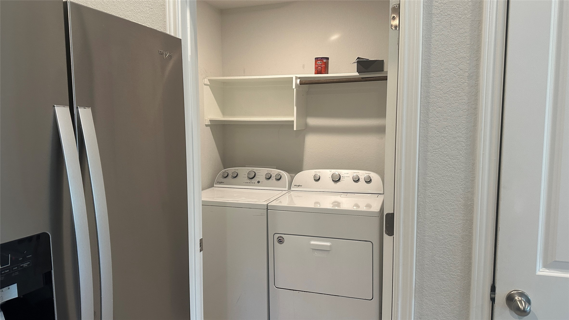 12321 Caldera Way Manor, TX 78653 - Photo 14 of 18 Laundry area featuring washing machine and dryer