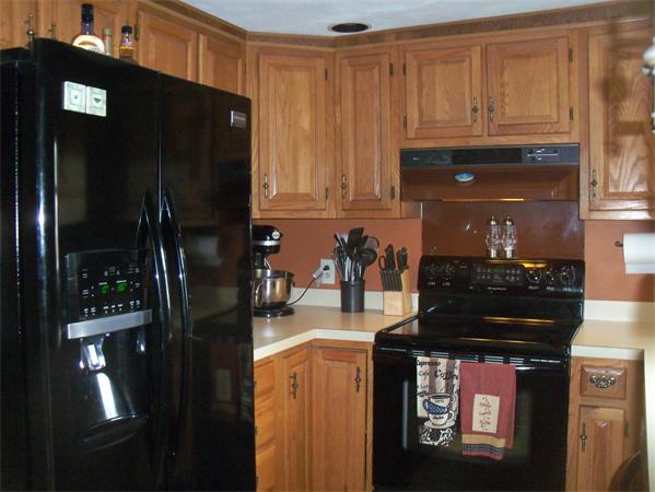 3 Allen Road Peabody, MA 01960 - Photo 3 of 15 a kitchen with stainless steel appliances granite countertop a refrigerator and a stove
