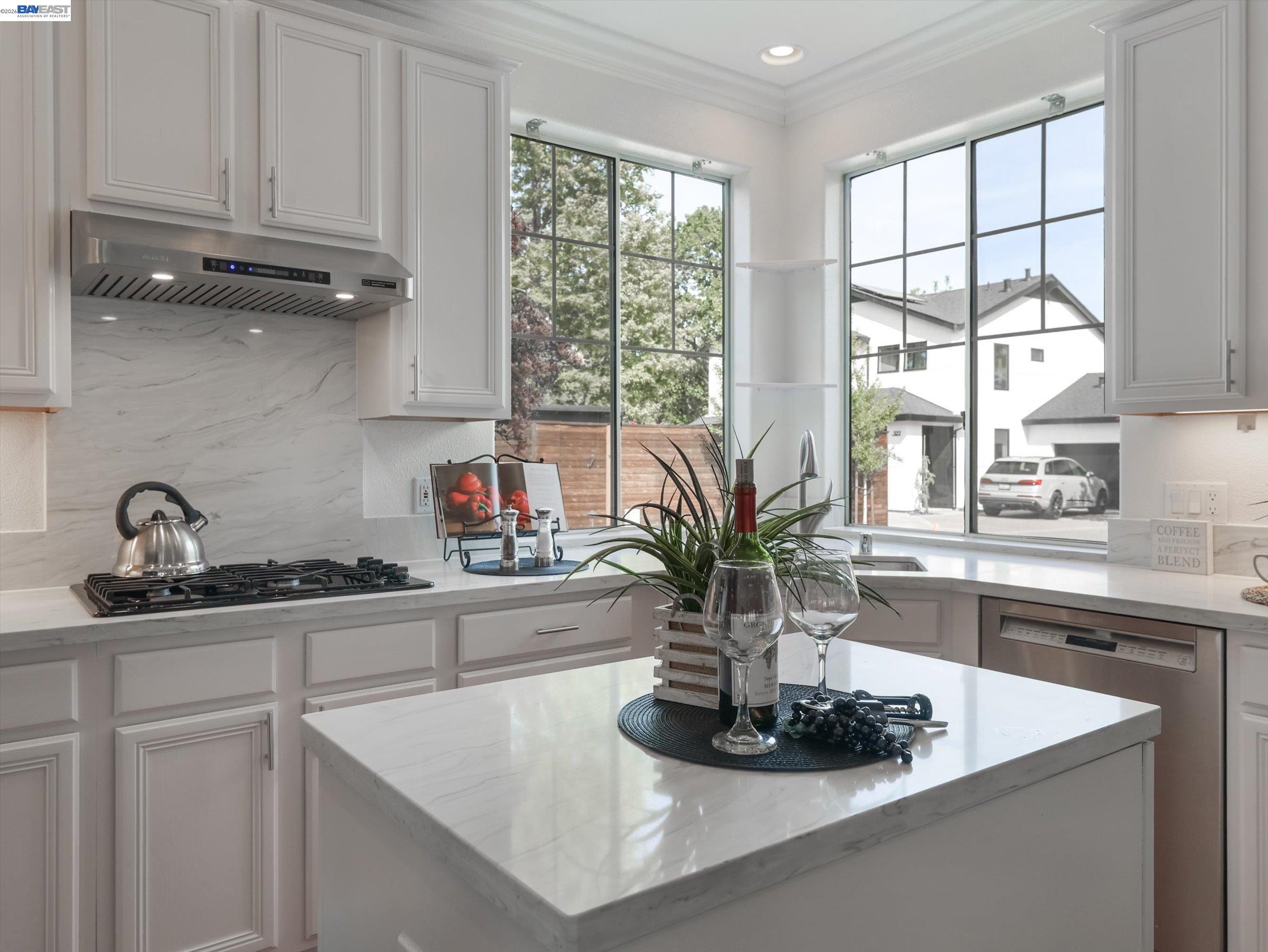 326 I Street Fremont, CA 94536 - Photo 17 of 40 a kitchen with a sink a window and cabinets