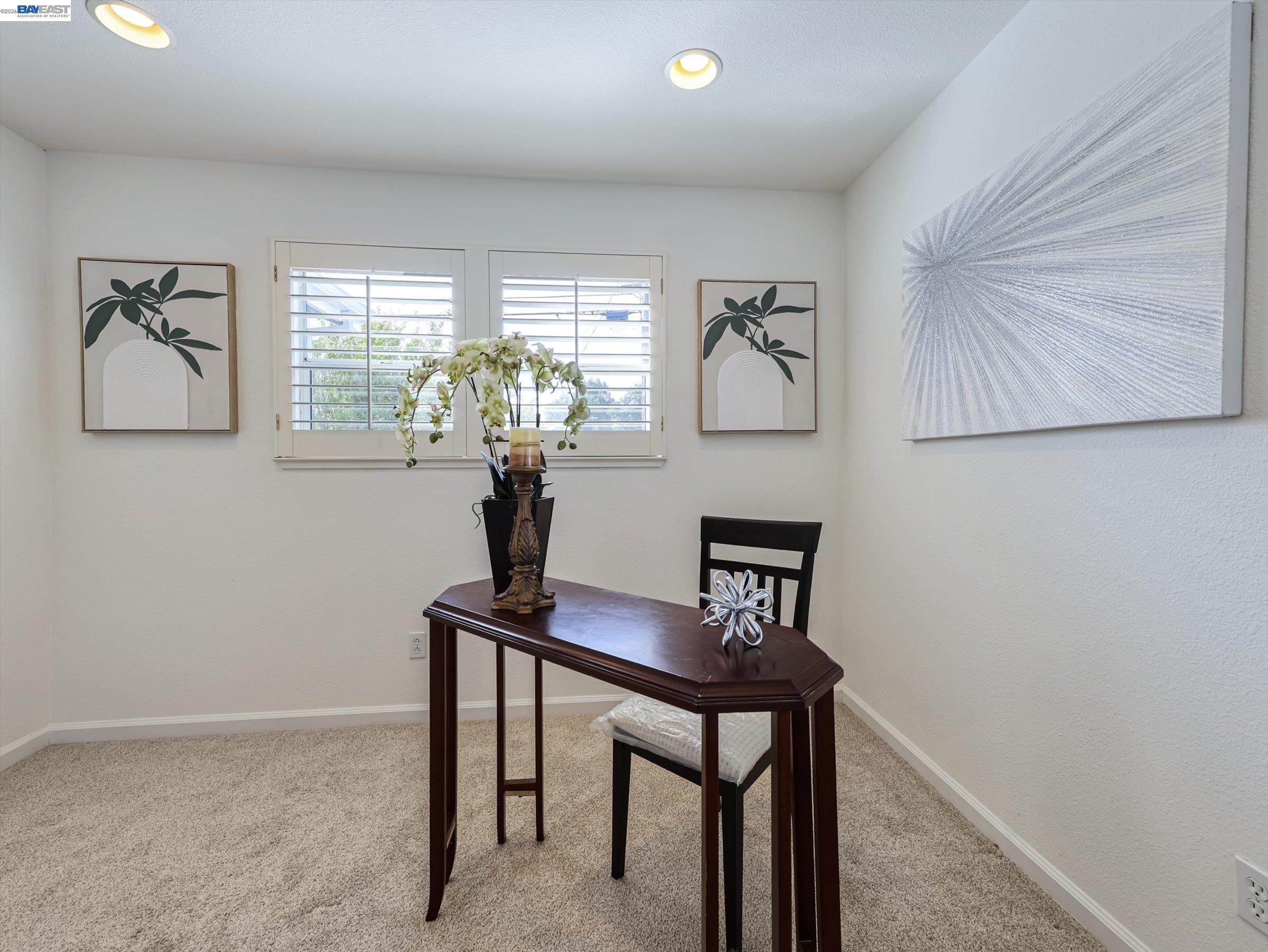 326 I Street Fremont, CA 94536 - Photo 27 of 40 a view of a workspace with furniture and a window