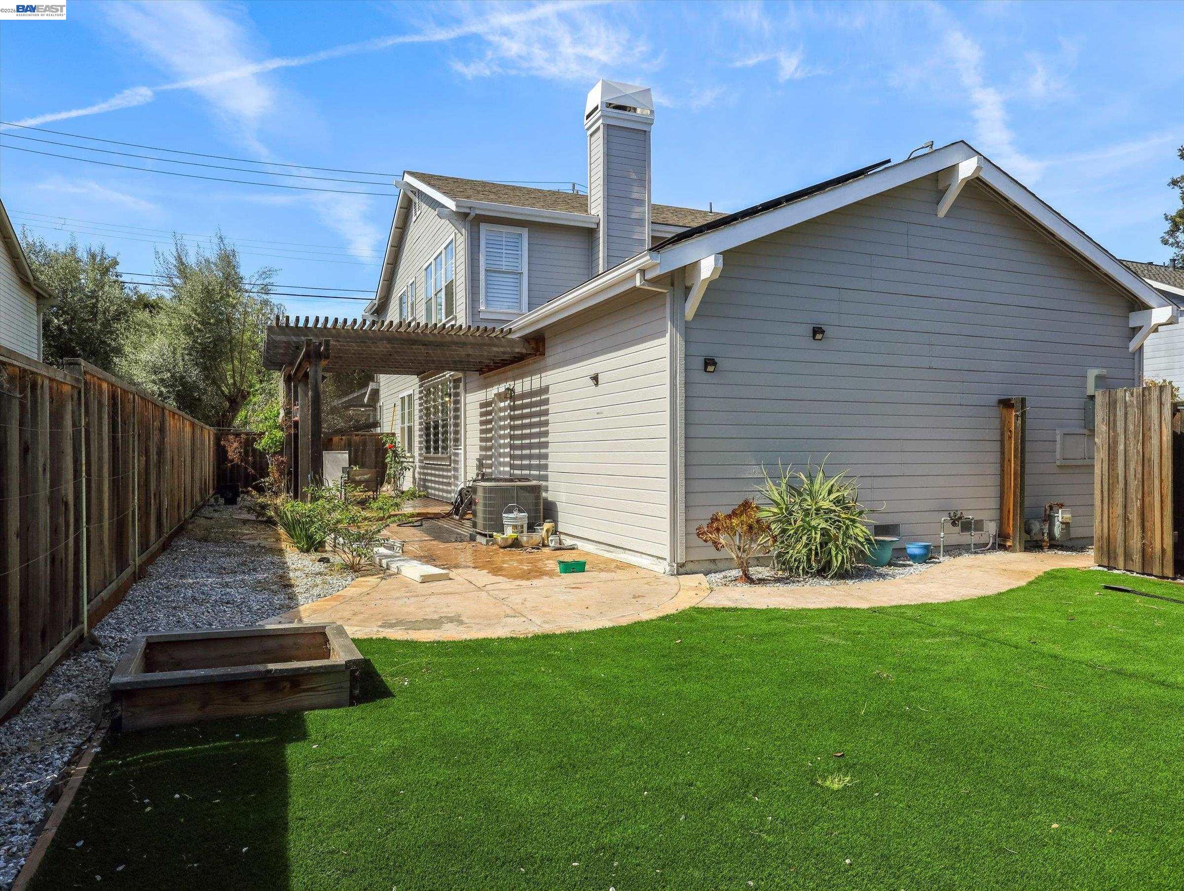 326 I Street Fremont, CA 94536 - Photo 32 of 40 a front view of a house with garden and porch