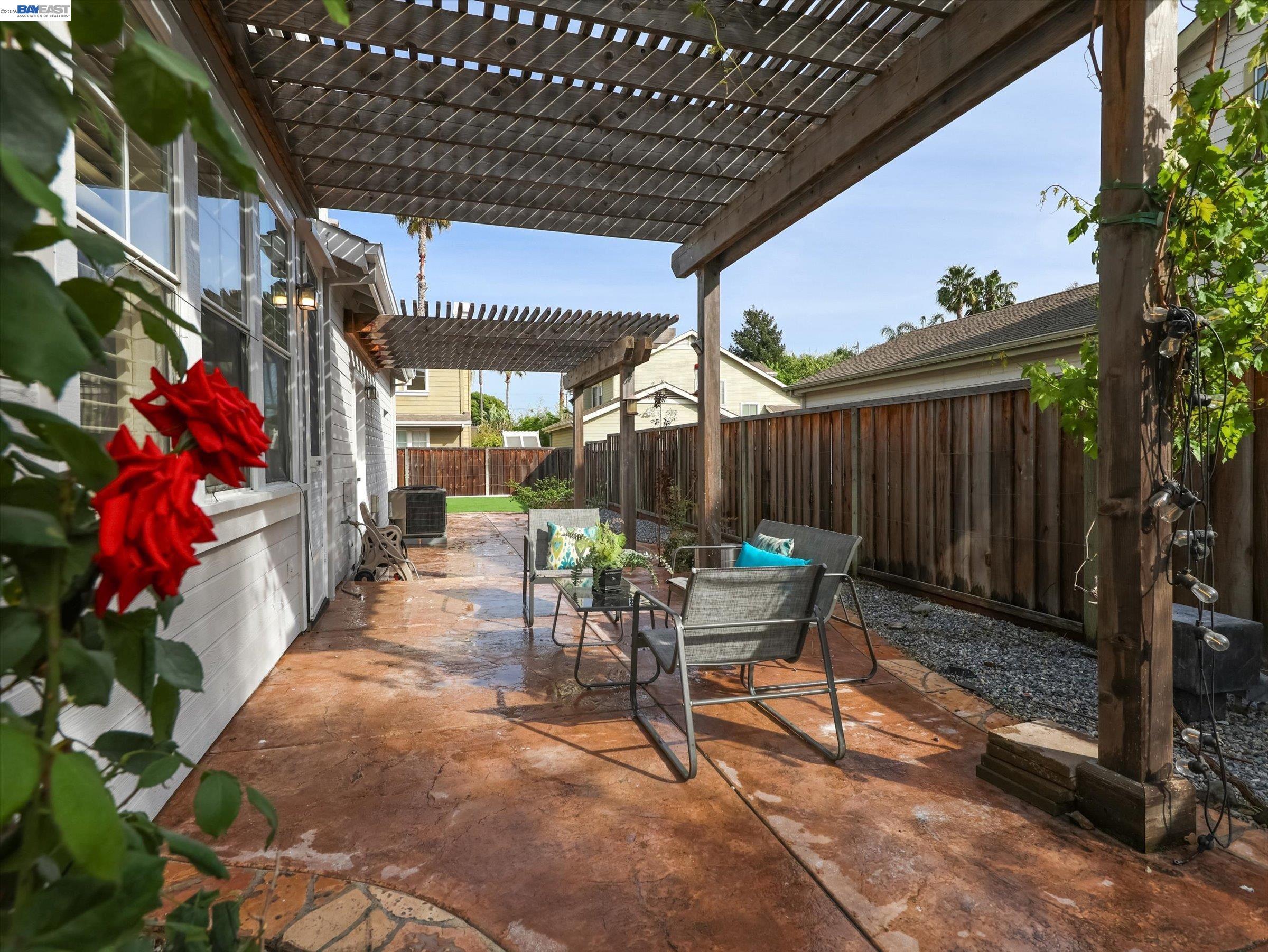 326 I Street Fremont, CA 94536 - Photo 33 of 40 a view of a patio with table and chairs and potted plants