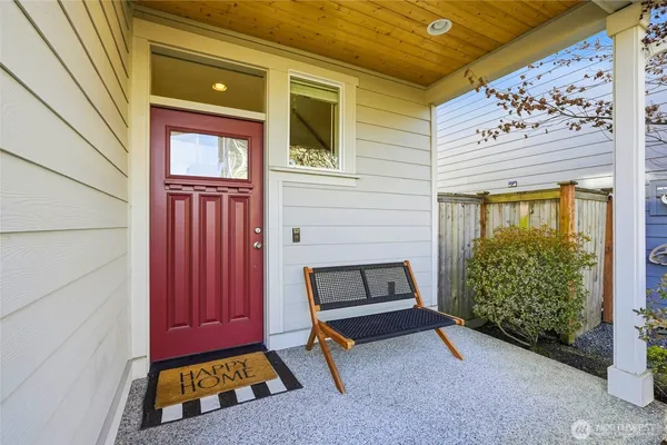 a bench is sitting in front of a door