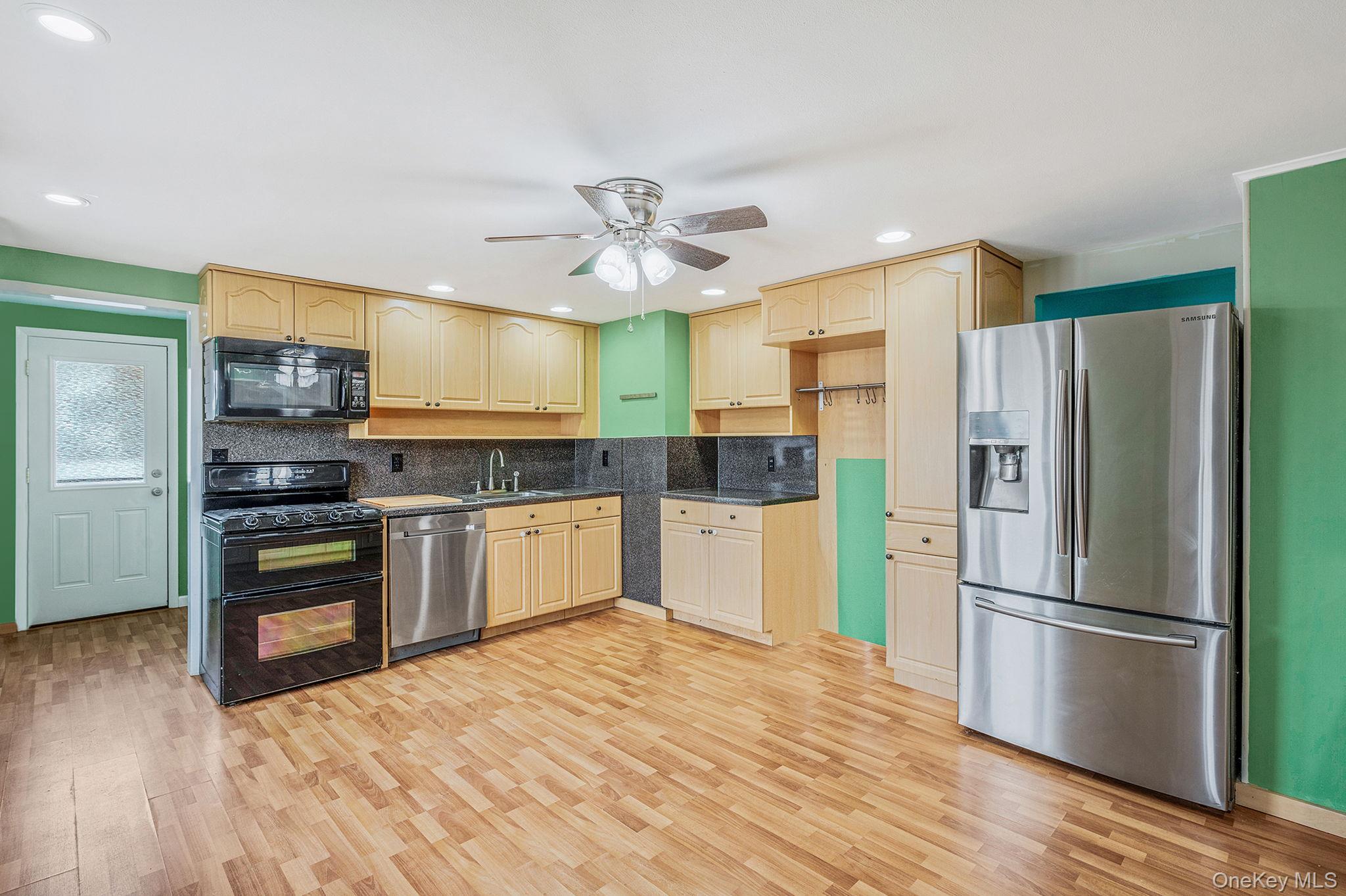 6 Rugby Drive West Shirley, NY 11967 - Photo 13 of 35 open conceptEat in kitchen